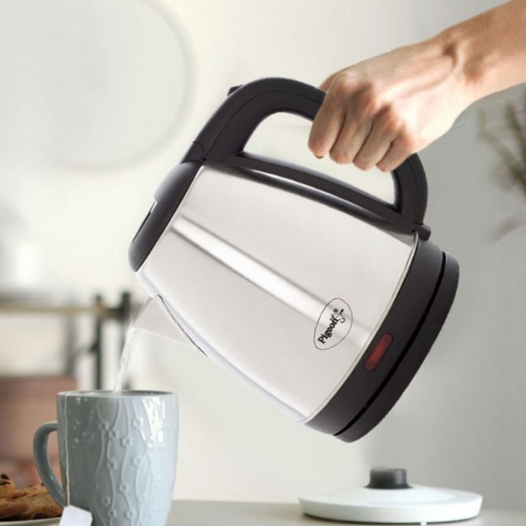 Pigeon Amaze Plus Electric Kettle with 1500W fast boil, cordless stainless steel design, BPA-free build, and mirror polish finish for modern Indian kitchens.
